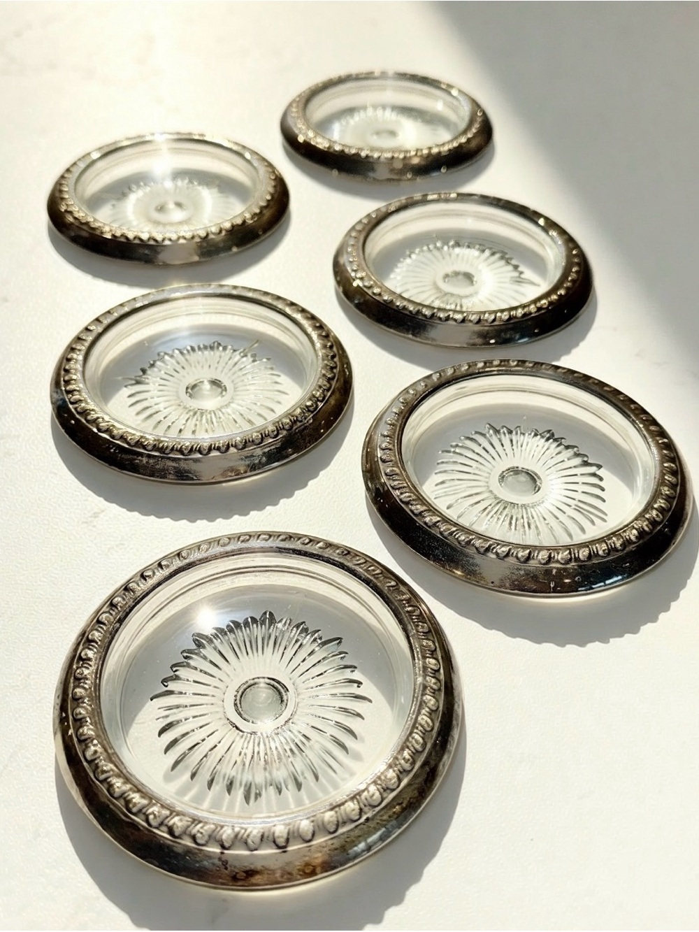 6 Sterling silver rimmed coasters
